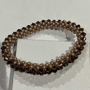 Pink simulated Pearl with gold sparkle bead woven rolling bracelet / arm band